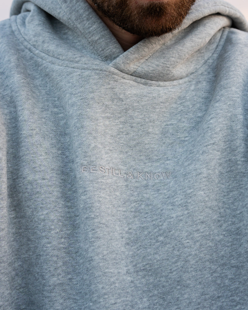 Heather Gray (BE STILL & KNOW): Tone on tone chest embroidery, Brett is 6'1" wearing size M