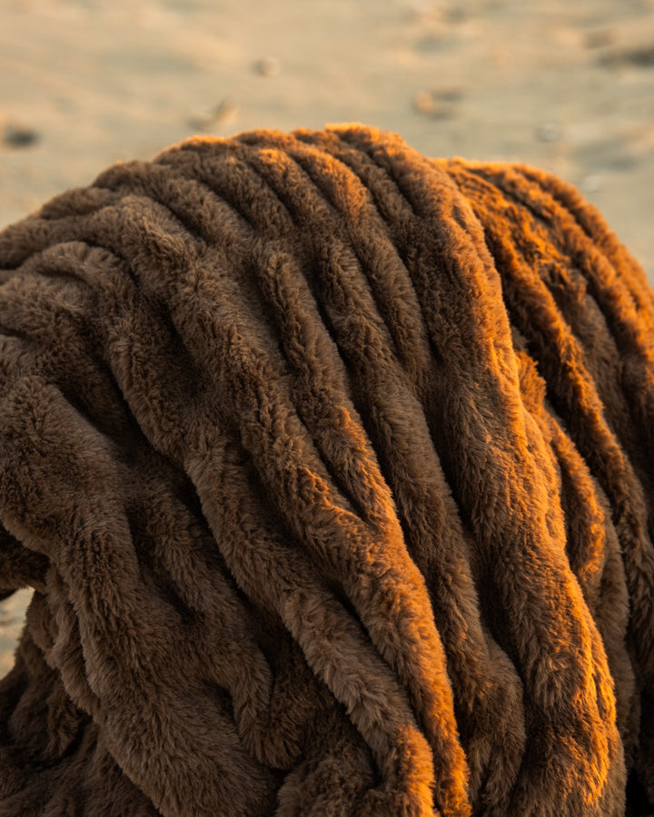 The Be Still Blanket on the beach