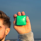 Green | In hand at the beach