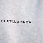 Heather White (BE STILL & KNOW) | BE STILL AND KNOW embroidered in black, Brett is 6'1" wearing size M