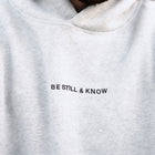 Heather White (BE STILL & KNOW) | Black chest embroidery, Brett is 6'1" wearing size M