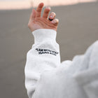 Heather White (BE STILL & KNOW) | I AM WITH YOU Isaiah 41:10 sleeve embroidery in black, Brett is 6'1" wearing size M