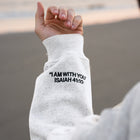 Heather White (BE STILL & KNOW) | I AM WITH YOU Isaiah 41:10 sleeve embroidery in black, Brett is 6'1" wearing size M