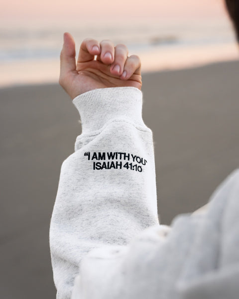 Heather White (BE STILL & KNOW) | I AM WITH YOU Isaiah 41:10 sleeve embroidery in black, Brett is 6'1" wearing size M