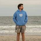 Light Blue | Brett is 6'1" wearing size XL