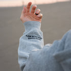 Heather Gray (BE STILL & KNOW) | I AM WITH YOU Isaiah 41:10 sleeve embroidery in black, Brett is 6'1" wearing size M